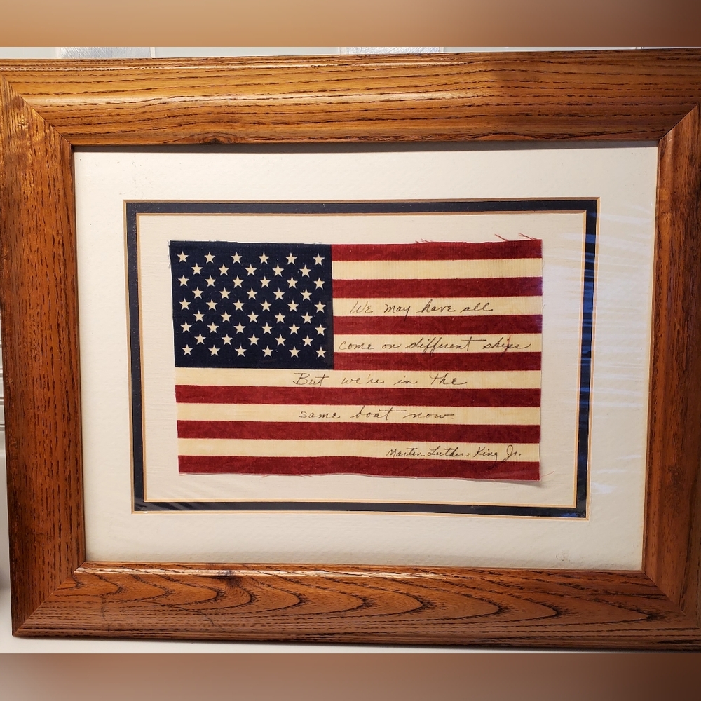 American flag with a quote by Martin Luther King Jr. written on it: Framed 12x14